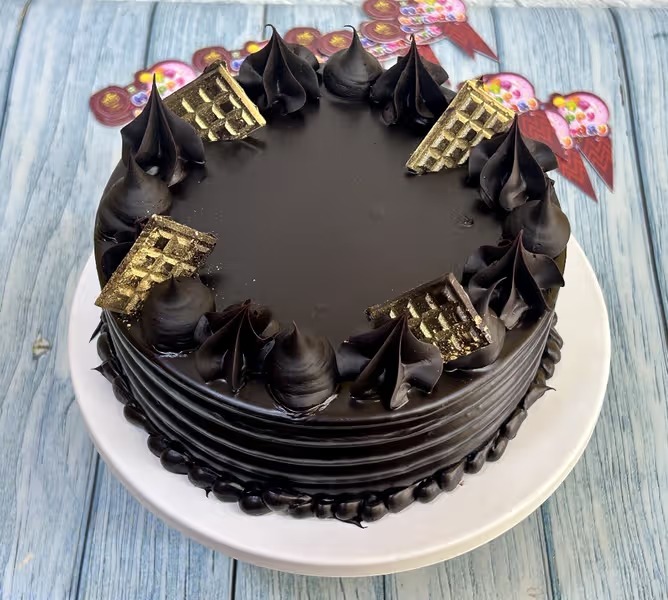 Freshly baked handcrafted Chocolate Excellent – Cake design by TF Cakes