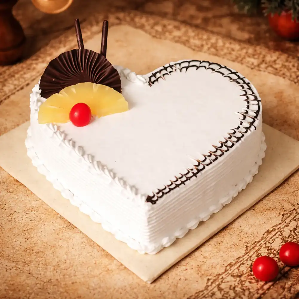 Pineapple Heart Shape Cream Cake - TF Cakes Online Delivery Freshly baked handcrafted Pineapple Heart Shape Cream Cake – Cake design by TF Cakes