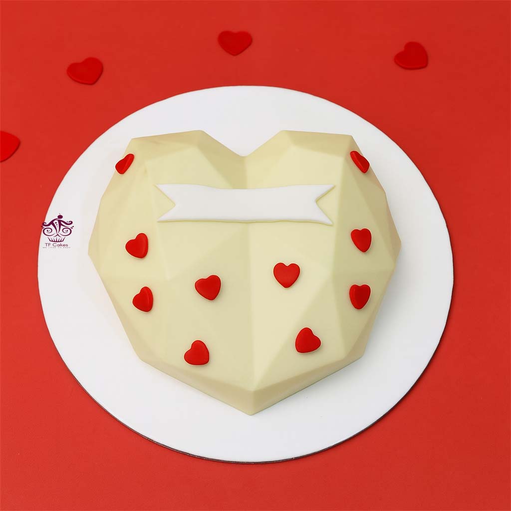 Heart-Shaped White Chocolate Pinata Cake - TF Cakes Online Delivery Freshly baked handcrafted Heart-Shaped White Chocolate Pinata Cake – Cake design by TF Cakes