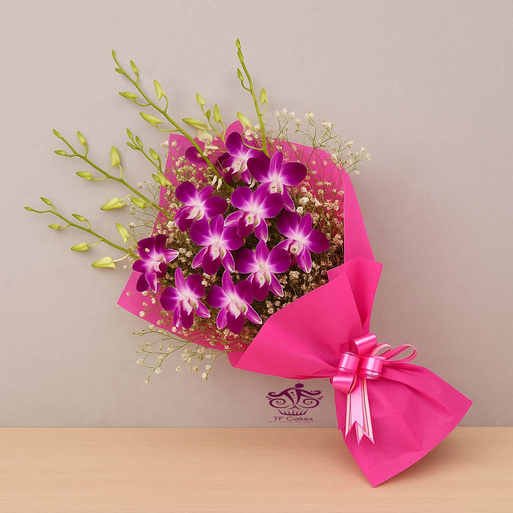 Freshly baked handcrafted Elegant Orchid Bouquet in Pink Wrap – Cake design by TF Cakes