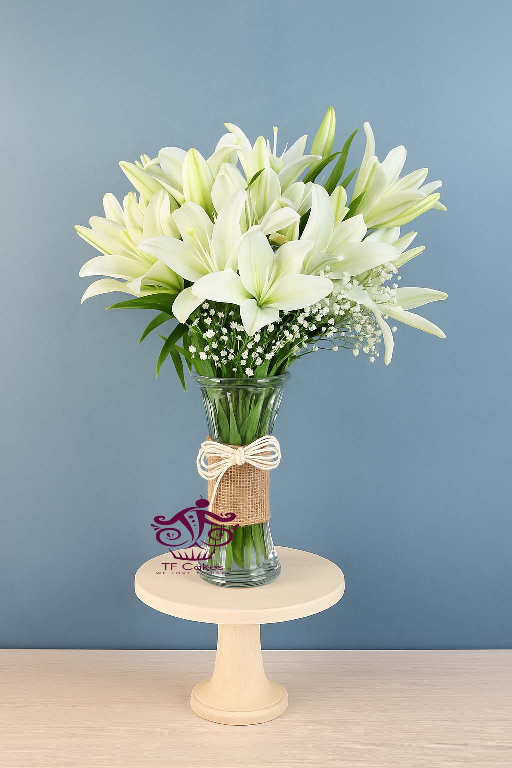 White Lilies in Glass Vase - TF Cakes Online Delivery Freshly baked handcrafted White Lilies in Glass Vase – Cake design by TF Cakes